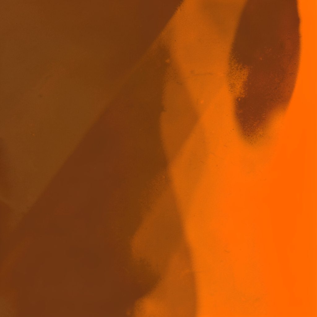 Warm duotone image in orange and cream tones depicting a soft abstract family moment